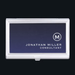 Boîtier Pour Cartes De Visite Monogramme bleu marine minimaliste<br><div class="desc">Améliorez votre jeu de réseautage avec ce coque carte de visite minimaliste avec un médaillon monogramme, nom et titre ou texte personnalisé de votre choix. Le design élégant et sophistiqué fait une déclaration d'élégance et de professionnalisme. Le coque est parfait pour tenir vos cartes de visite, cartes de crédit ou...</div>