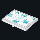 Boîtier Pour Cartes De Visite Palmier feuille motif turquoise et blanc<br><div class="desc">Elégante et moderne, motif feuille de palmiers tropicaux bleu turquoise. Arrière - plan blanc accentué de petits points de couleur feuille. modèle d'échantillon design d'intérieur. Si vous avez besoin d'aide pour customiser ce design ou tout design sur Zazzle, envoyez un e-mail au concepteur. Il est toujours gratuit et opportun avec...</div>
