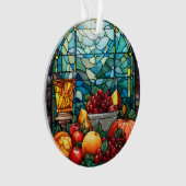 Bol de fruits en verre tendu (devant)