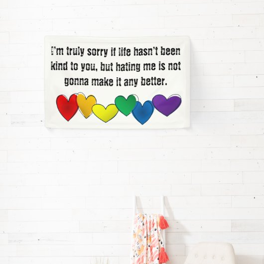 Boodschap tegen haat met regenboogharten spandoek (Insitu)