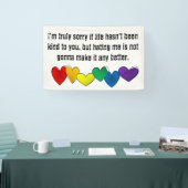 Boodschap tegen haat met regenboogharten spandoek (Beurs)