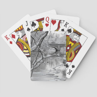 Boogbrug over bevroren rivier in de winter pokerkaarten