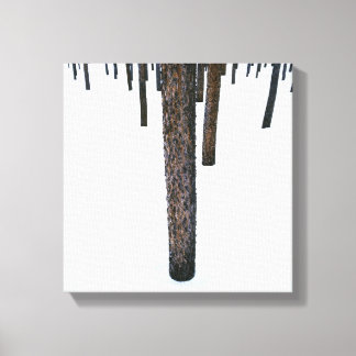 Boomboomstammen in sneeuw canvas afdruk