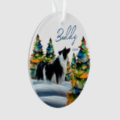 Border Collie dans la forêt enneigée d'hiver arbre (devant)
