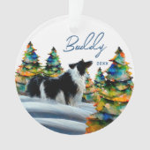 Border Collie dans la forêt enneigée d'hiver arbre (devant)