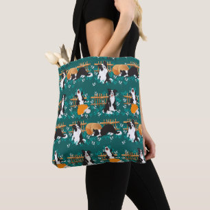 Border Collie speelt met schapen Draagtas