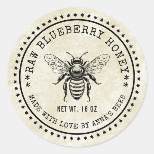 Bosbessenhoning label met bij en vintage uitstrali