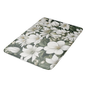 Botanische witte bloemen op groene bladeren badmat