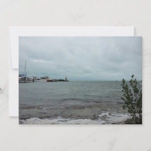 Boten en vuurtoren op oceaan landschap foto feestdagenkaart