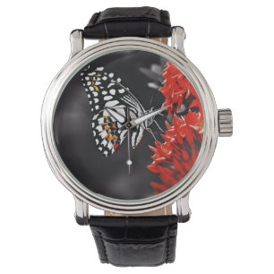 Botervlieg op rode bloemen horloge