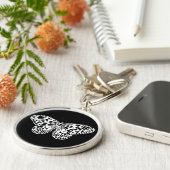 Botervliegschets, wit en zwart sleutelhanger (Zijkant)