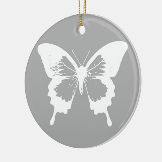 Botervliegschets, zilvergrijs en wit keramisch ornament (Links)