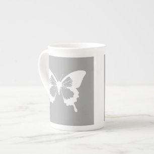 Botervliegschets, zilvergrijs en wit porselein kop