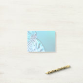 Botervliesblauwe en zwarte foto post-it® notes (Op bureau)