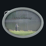 Boucle De Ceinture Ovale La vie c'est une ceinture de pêche<br><div class="desc">Life est une photo de pêche de l'homme pêchant lors d'une belle journée de printemps dans l'étang du parc. Cliquez pour personnaliser le texte ou télécharger votre propre image. Photographie originale de TamiraZDesigns.</div>