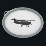Boucle De Ceinture Ovale Vol noir classique de silhouette de Cessna<br><div class="desc">Un vol de silhouette de Cessna d'avions pour n'importe quel enthousiaste d'aviation, customisent ceci avec le texte et votre choix de couleur d'arrière - plan. Changez facilement la couleur de cet arrière - plan de conception du blanc de préréglage en n'importe quelle couleur de votre choix dans une étape. Cliquez...</div>