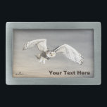 Boucle De Ceinture Rectangulaire Chouette des neiges<br><div class="desc">Un rendu numérique d'un Chouette neigeuse (Bubo scandiacus) superposé à un arrière - plan du ciel gris hivernal. Ajoutez votre propre texte. La Chouette des neiges est endémique dans les régions arctiques de l'Amérique du Nord et de l'Eurasie. Les mâles sont presque blancs, tandis que les femelles, comme dans cette...</div>