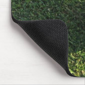 Boule de golf sur le tapis de souris de vert de (Coin)