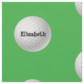 Boule de golf sur le tissu vert (Fermer)