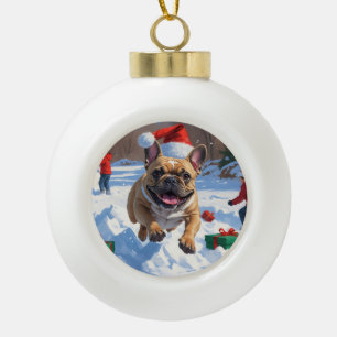 Boule En Céramique Bouledogue français courant dans la neige avec un