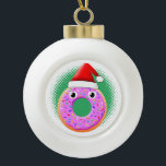 Boule En Céramique Donut Avec Yeux Et Saupoudrer Santas Dessin Casque<br><div class="desc">Jolies décorations personnalisées avec beignet de caricature en casquette Père Noël. Idée cadeau pour les enfants.</div>