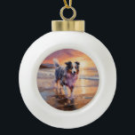 Boule En Céramique Sandy Australian Shepherd Dog on Beach Sunset<br><div class="desc">Plongez dans la beauté tranquille de notre chien "Sandy Paws and Sunset Hues" sur le coucher du soleil de plage. Cette scène captivante saisit l'essence d'une soirée parfaite au bord de l'eau, avec un fidèle compagnon canin qui profite du sable doré et des teintes époustouflantes du soleil couchant. Que vous...</div>