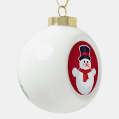 Boule En Céramique Snowman de Noël sur l'Arrière - plan rouge (Gauche)