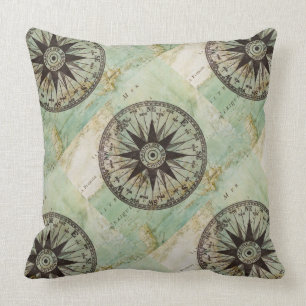 Boussole et coussin nautiques antiques de carte