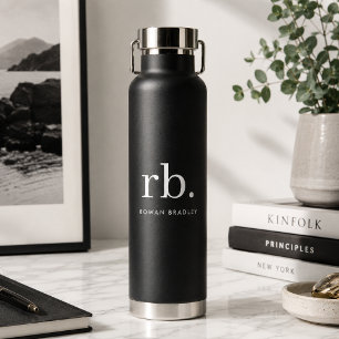 Bouteille d'eau à monogramme noir Flasque isolé
