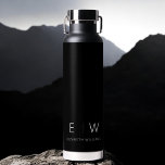 Bouteille D'eau Classic Élégant Moderne Minimaliste Nom Monogramme<br><div class="desc">Élevez votre routine d'hydratation avec notre bouteille d'eau noire Monogramme moderne classique élégant. Conçue avec soin, cette bouteille d'eau allie élégance intemporelle et minimalisme contemporain, ce qui en fait un accessoire élégant et fonctionnel pour votre quotidien. Réalisée avec précision et attention au détail, cette bouteille d'eau est plus qu'un simple...</div>