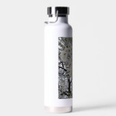 Bouteille d'eau en fleurs (Plage)