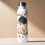 Bouteille D'eau Femme Aquarelle Avec Coiffure Noire Affirmation Bo<br><div class="desc">Donnez de l'énergie à votre journée avec cette bouteille d'eau d'aquarelle rehaussée de couleur boho affirmation. Avec une belle illustration d'une femme aux cheveux noirs flottants, cette bouteille est un rappel pour embrasser votre beauté naturelle et célébrer votre force. Les affirmations inspirantes imprimées sur la bouteille vous encourageront à rester...</div>