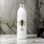 Bouteille D'eau Typographie minimaliste initiale des abeilles<br><div class="desc">Capturant l'essence de la simplicité,  ce design présente une représentation minimaliste d'une abeille dans la typographie. Les courbes gracieuses et les lignes épurées se fondent harmonieusement pour transmettre la beauté complexe de la nature,  encapsulant l'essence de l'abeille d'une manière visuelle et directe.</div>