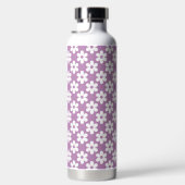 BOUTEILLE D'EAU VIOLET AVEC FLEURS DE DAISY BLANCHES (Droite)