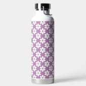 BOUTEILLE D'EAU VIOLET AVEC FLEURS DE DAISY BLANCHES (Droite)