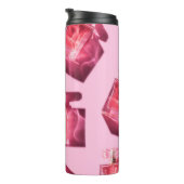 Bouteilles de parfum, arrière - plan rose, plat (Tourné sur la droite)