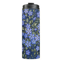 Charmantes fleurs de pervenche dispersées bleu pro