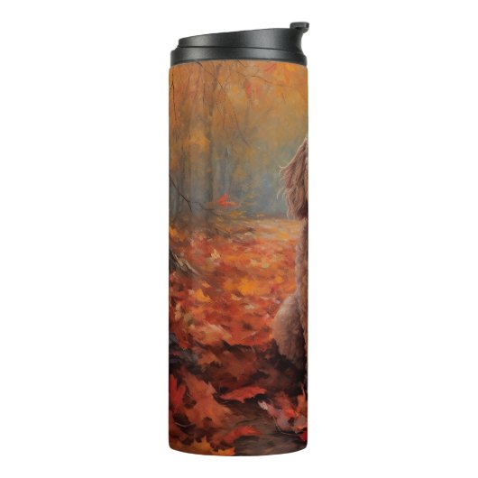 Bouteilles Isothermes Cockapou dans les feuilles d'automne automne autom (Tourné sur la gauche)