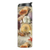 Bouteilles Isothermes Coques de mer sur la plage (Tourné sur la gauche)