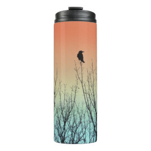 Bouteilles Isothermes Corbeau dans un ciel de couleur ombrée