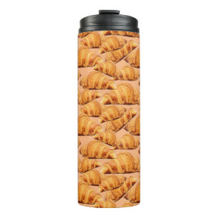 Bouteilles Isothermes croissant d'or, motif sans couture de boulangerie.