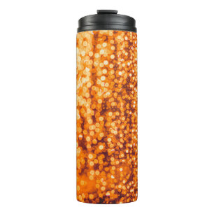 Bouteilles Isothermes Des gouttes orange sur verre, arrière - plan abstr