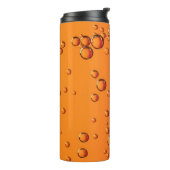 Bouteilles Isothermes gouttelettes d'eau sur la surface orange (Tourné sur la gauche)