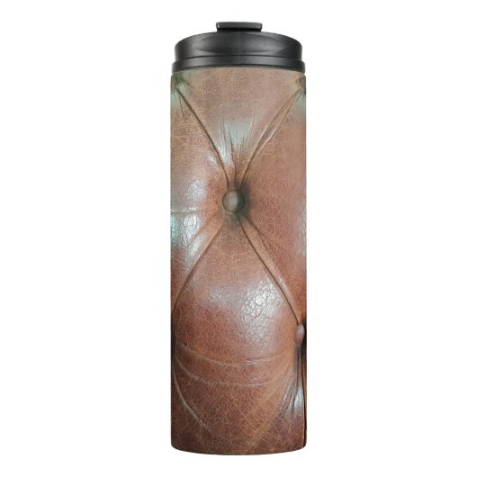 Bouteilles Isothermes Lumière sur la surface du canapé en cuir marron, t (Devant)