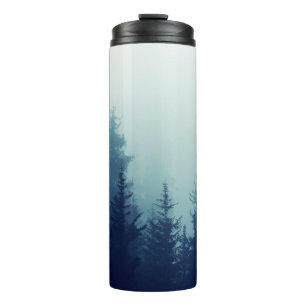 Bouteilles Isothermes Misty fog in pine forest on mountain slopes. Color