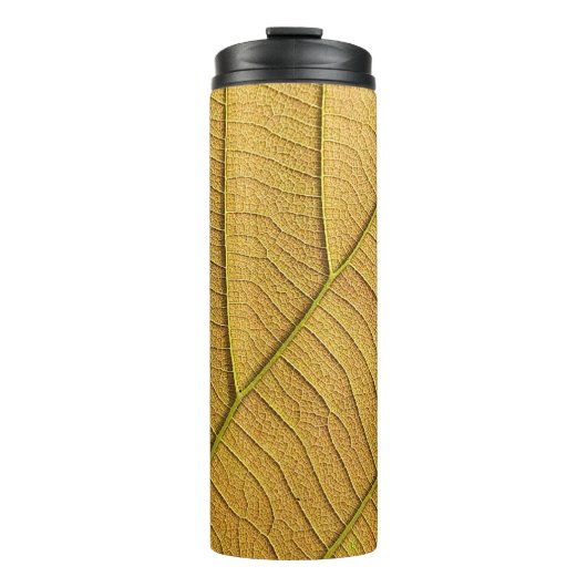Bouteilles Isothermes Motif de feuille jaune doré le matin. (Devant)