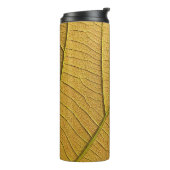Bouteilles Isothermes Motif de feuille jaune doré le matin. (Tourné sur la gauche)