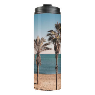 Bouteilles Isothermes Palmier sur la plage le matin