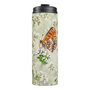 Bouteilles Isothermes Papillon orange sur des fleurs blanches délicates