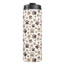 Tasse thermique aux empreintes de pattes boueuses